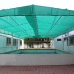 Swimming pool covered with shade
